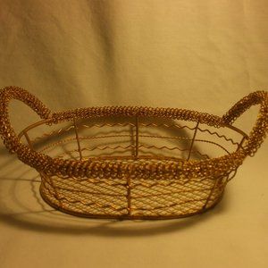 Golden oval metal basket